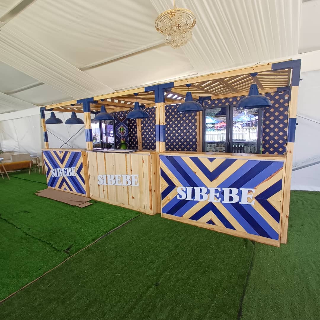 sketchdesign8's tweet photo. We might be a little late posting this one, but great work deserves to be seen! Our Sibebe Premium Lager setup at the Eswatini Farmers Market showcased style, colour and comfort with a bold brand presence that truly stood out. 💙 https://t.co/VP8Fq0dNXS