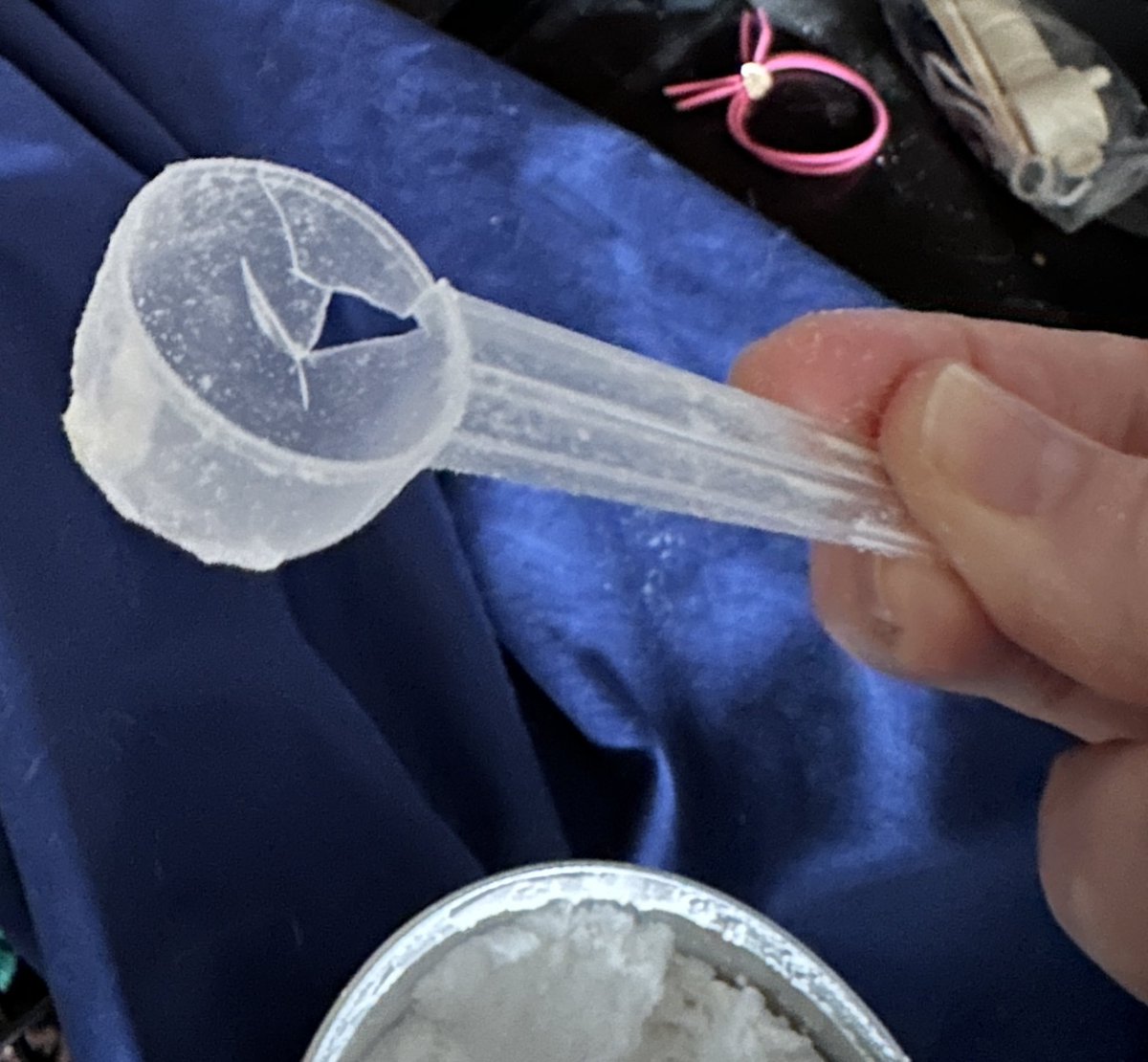 lauraspaeth2's tweet photo. @Enfamil This cracked scoop was in our $60 can of PurAmino. What the heck?!? https://t.co/wOCr5EsGwG