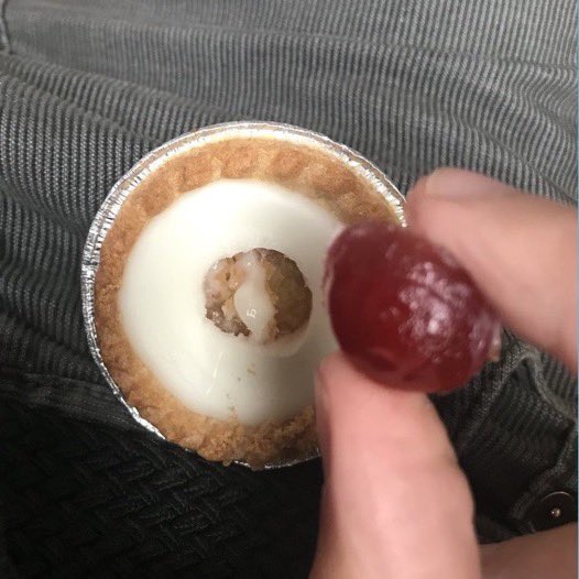 NoContextBrits's tweet image. How to eat a Cherry Bakewell.