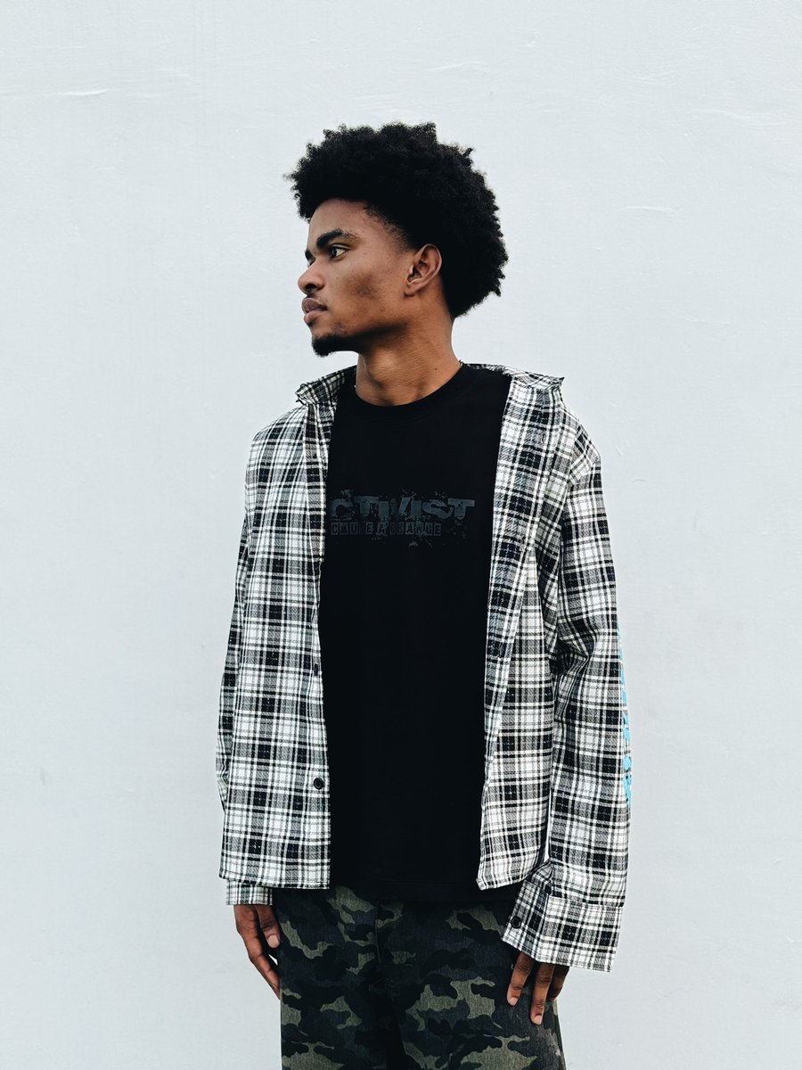 B/W button up plaid shirt available now in-store and on our website(activist.store)50gh off on website for only 24hrs

cause a change!