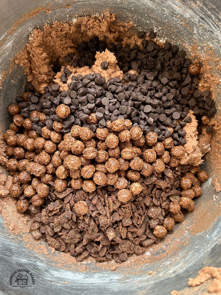 MadisonSqBakery's tweet image. Chocolate dough with basically chocolate everything from the grocery store cereal aisle lol. Cocoa Pebbles, Cocoa Puffs, and chocolate chips. 🍫🍪