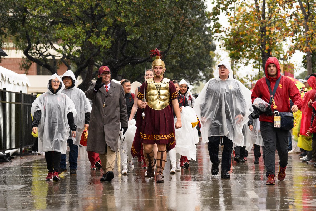 USC's tweet image. Rain or shine, Trojans show up for each other and their university. While Trojans cross the globe, this is always home.