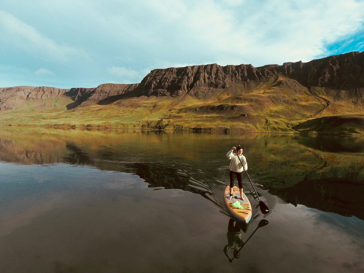 supconnect's tweet image. Still water, rugged cliffs, and endless calm — can you guess the location?✨
Photo: Paddle North
 #supconnect #paddleboarding #standuppaddle