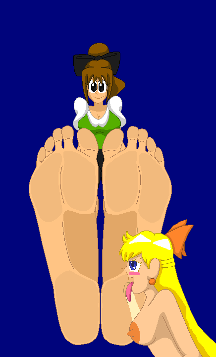 "Exactly what you need, licking my soft feet fresh from boots and socks. Lick my soles good enough and I'll indulge your foot fetish~" Dina teases while Minako licks her big soles. #bigfeet #longtoes #bigsoles #barefoot #domination #humiliation #footslave #footworship