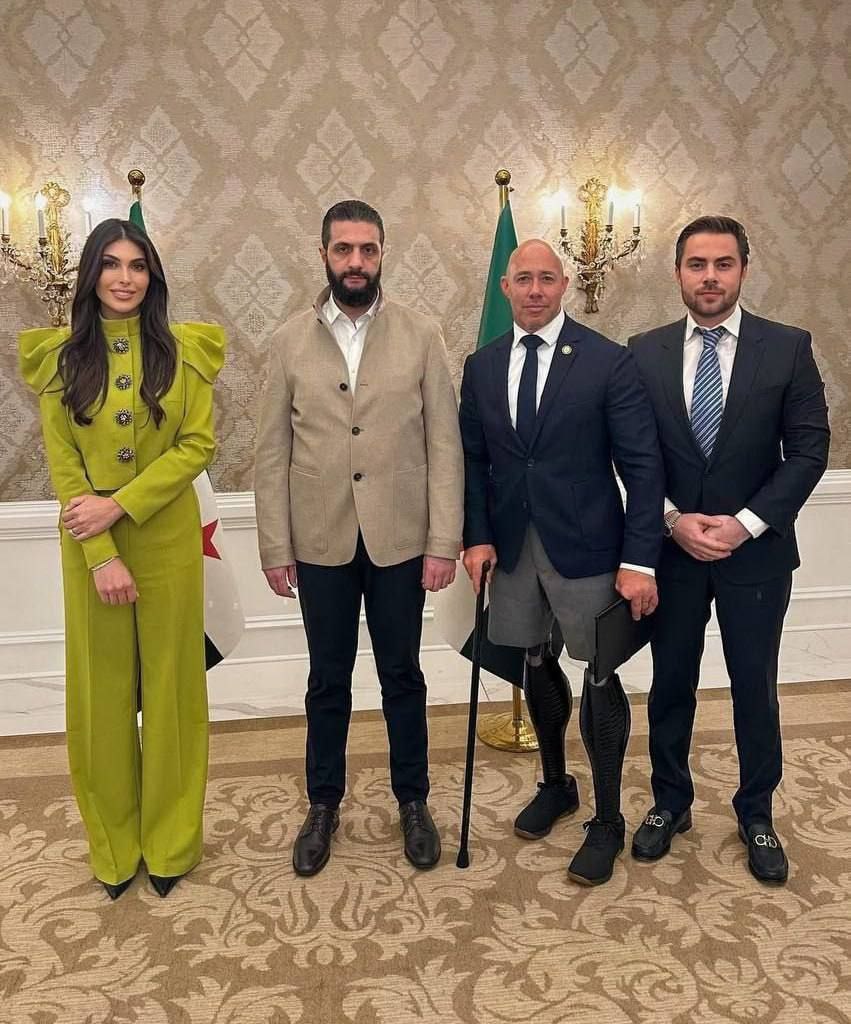 MOSSADil's tweet image. HOW DID WE GET HERE?
U.S. Congressman Brian Mast, who lost both legs to an IED blast in Afghanistan (2010), now seen standing beside Abu Mohammad al-Julani, once a field commander for Al-Qaeda in Iraq, the group that built and deployed IEDs against American troops, killing and…