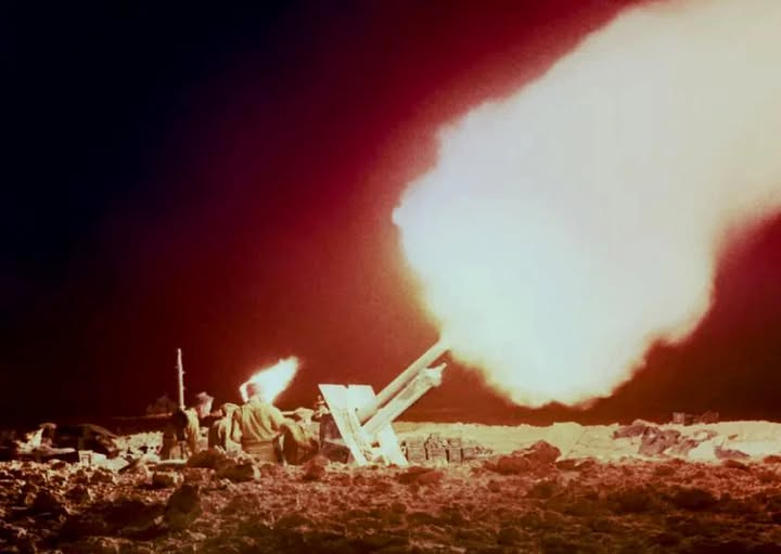 25-pounder guns fire at AfrikaKorps positions during the battle of Gazala in Libya by South African Forces, 02 June 1942.