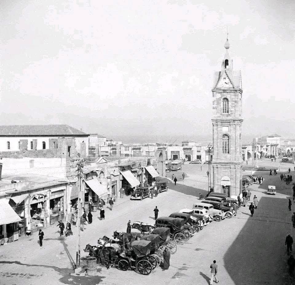 #يافا محطة السيارات وعربات الخيول في برج الساعة في يافا - عام 1920