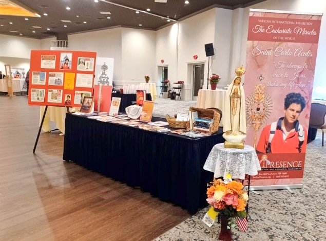 TheGrottoParish's tweet photo. Cardinal Mueller at Call to Holiness Conference and Eucharistic  Miracles Table. Assumption Grotto will house the exhibit in between showings. If anyone wishes to display the exhibit at an event or parish, call the rectory. Let's help St. Carlo Acutis build the Highway to Heaven! https://t.co/ZzB04CyiOw
