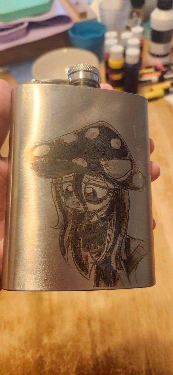 buttercupsayn's tweet photo. Art by @LBRCloud (commission) and laser-etched #pony #flask made by Welderanon of #Jellycap ... She's had a bad day so it's alcohol time. Thimking about getting some hard cider to put in it. What's a good brand? #mlpfim #mlpfanart https://t.co/Rbug7Leqa9