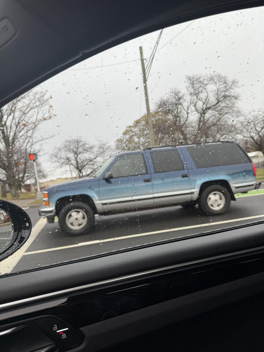 klorcze21's tweet photo. @DougDeMuro Spotted this in CT today. Late 90's Chevy Suburban that surprisingly wasn't rusted out and the original wheels aren't pitted. Driving myself crazy trying to remember this paint name/option https://t.co/baoFFf9avV