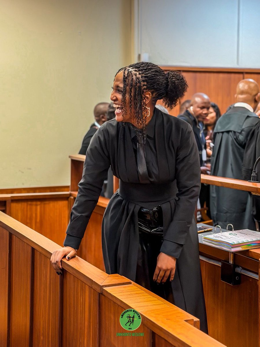 Shezwethu's tweet image. Even in the courtroom, the spirit remains high! Hon. Duduzile Zuma-Sambudla sharing smiles and gratitude with the comrades. We are supported by Second Deputy President Cde Tony Yengeni and Head of Presidency Magasela Mzobe. Amandla!! #weseeyou