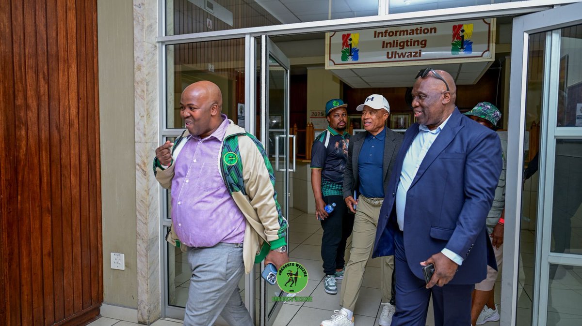 Shezwethu's tweet image. Even in the courtroom, the spirit remains high! Hon. Duduzile Zuma-Sambudla sharing smiles and gratitude with the comrades. We are supported by Second Deputy President Cde Tony Yengeni and Head of Presidency Magasela Mzobe. Amandla!! #weseeyou