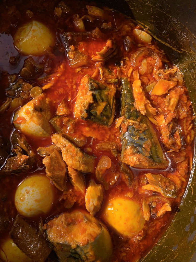 palm oil stew. 

proteins: smoked mackerel, pomo, egg, and fresh mackerel.