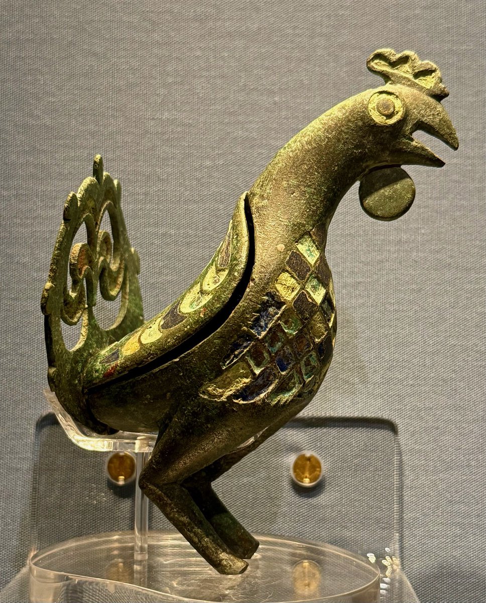 A bronze and enamel cockerel figurine from Roman Cirencester (Corinium). Dating to the later 3rd or 4th centuries AD, the figurine was discovered during the Bridges Garage Excavations. Now part of the collections at Corinium Museum in Cirencester. 📸 My own. #RomanBritain
