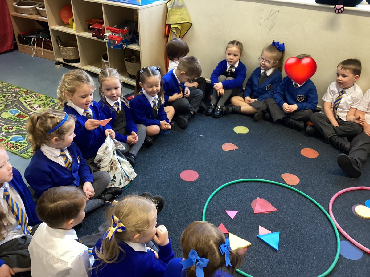 ReceptionSTP's tweet image. In maths we have been learning all about Circles and Triangles, the children used their knowledge of the shapes to describe what they had chosen from the mystery bag and sorted the shapes into the correct hoops. #EYFSatSTP #MathsatSTP