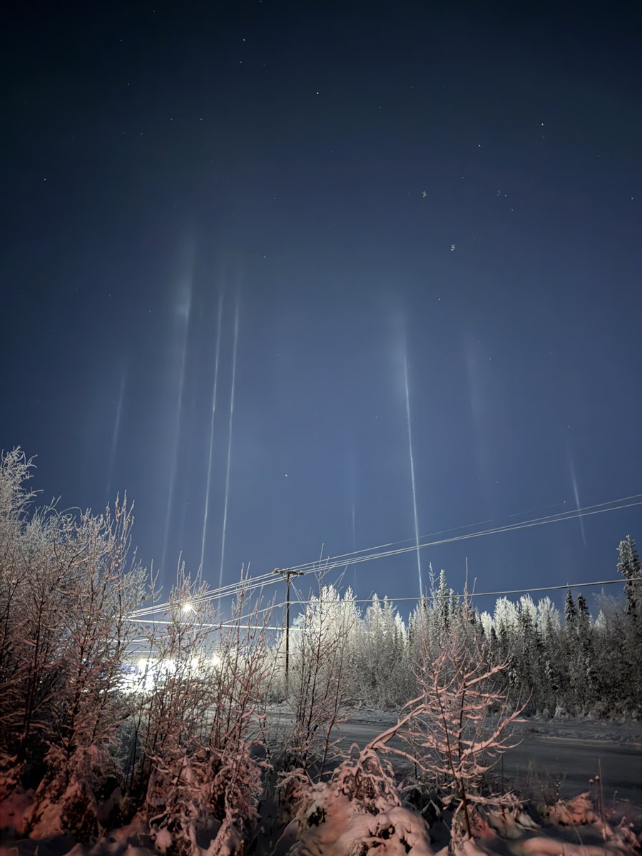 Nice light pillars now from my driveway here in North Pole, Alaska. The air temperature is -7 F.