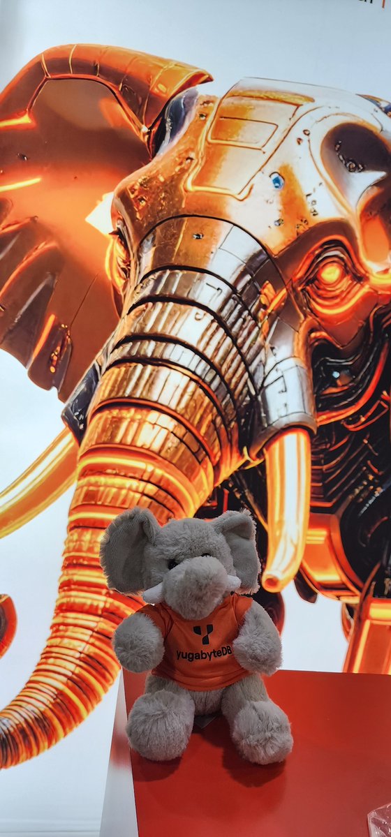 Look at our #KubeCon <a href="/Yugabyte/">YugabyteDB</a>  booth! You can't miss the elephant 🐘 - pick up one of your own to take home!