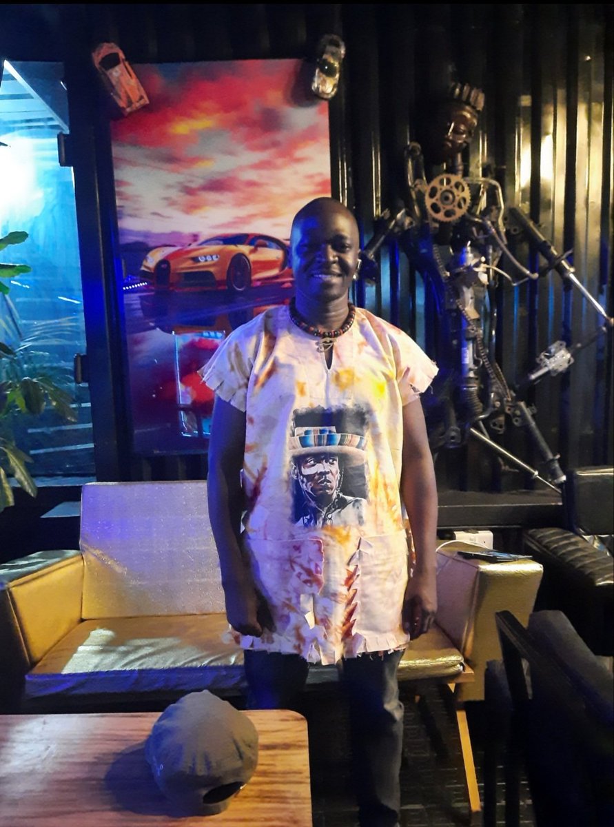 Who pulled off the 'Elegant, with an African touch' dress code better?