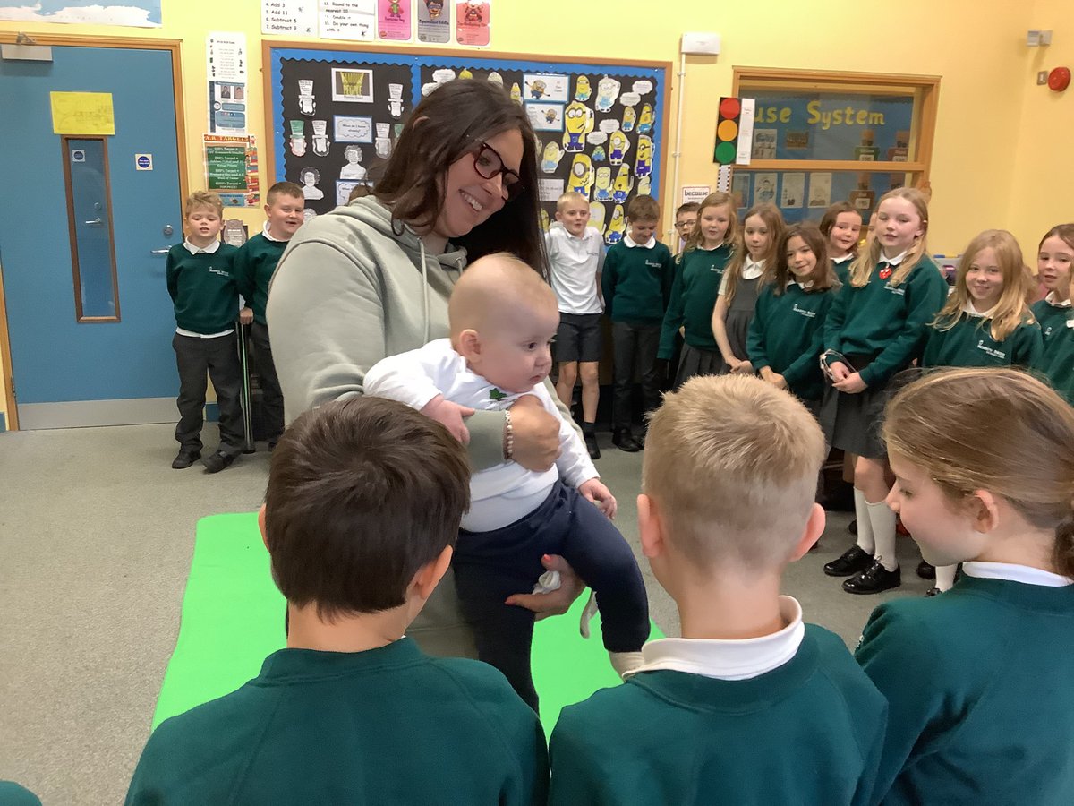 Miss Campbell’s P5 class had a very special Roots of Empathy session with Megan and baby Cillian. They got to hear about Cillian’s development… how he sleeps and what he likes to play with. We thank Megan for sharing her lovely baby with us.