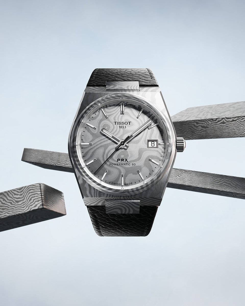 TISSOT's tweet photo. Who needs a plus one when your watch can do the talking? Celebrate being single, bold, and completely unique, just like every Tissot PRX 38mm in Damascus steel. https://t.co/vcevzA8xgC