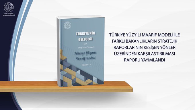 A blue book cover titled Turkiye Yuzyili Maarif Modeli ile Farkli Bakanliklarin Stratejik Raporlarinin Kesisen Yonler Uzerinden Karsilastirilmasi Raporu sits on a wooden shelf. The cover features geometric abstract designs in blue and white tones. Official seals from the Turkish Ministry of Education appear on the top and bottom. Subtitles indicate it is a comparative report on strategic intersections from various ministries perspectives.