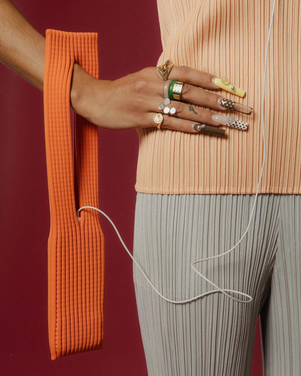 fashionroadman's tweet image. Issey Miyake &amp;amp; Apple just launched a new collaboration called the I-Phone pocket and to me it makes absolutely no sense - No zip, no structure and considering how many thefts of I-phones there are these days… NO SECURITY? This is nothing more than a sock, rebranded as a cash…