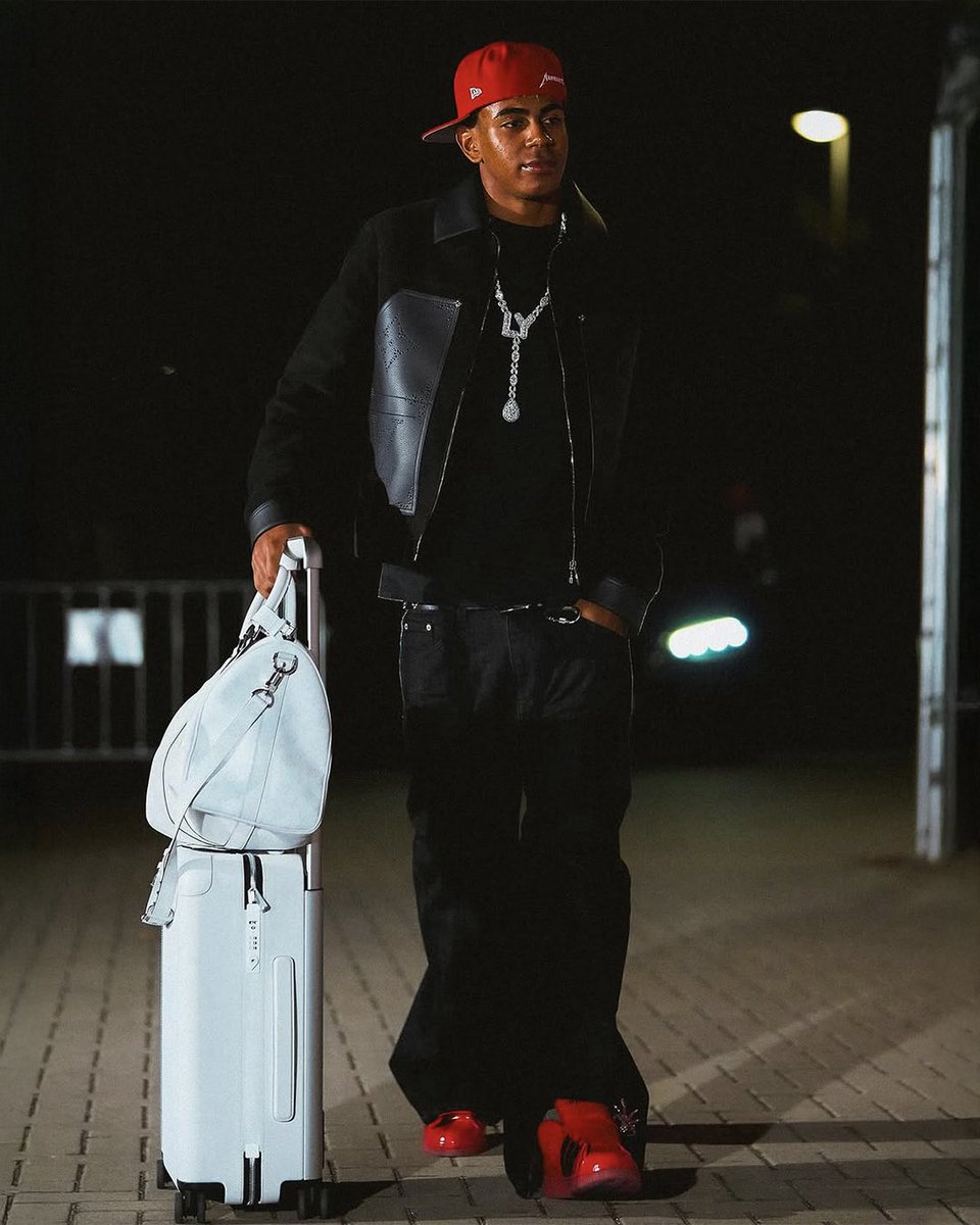 Lamine Yamal pulled up in an unseen red Sp5der x adidas Superstar