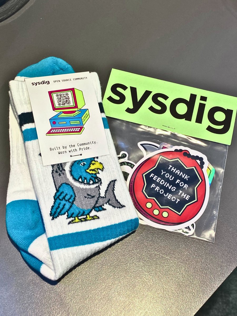 sysdig's tweet image. ☸️ Sysdig is making waves at @KubeCon_ 𝗯𝗼𝗼𝘁𝗵 𝟵𝟮𝟬 with new open source innovations, AI-powered Kubernetes threat detection, and yes — adorable 🦅 @Falco_org + 𝗦𝘁𝗿𝗮𝘁𝗼𝘀𝗵𝗮𝗿𝗸 🦈  socks! 🧦 

🤝 Meet @WiresharkF founders @LorisDegio (Sysdig Founder &amp;amp; CTO) and…