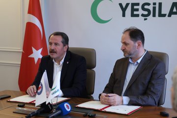 First image shows two men in suits sitting at a table with Turkish flags, Yeşilay logo on wall, documents and microphones present, one man signing a paper. Second image depicts a group of eight people including men and women some in hijabs around a long table with Turkish, EU, and Yeşilay flags, documents and water glasses on table. Third image features two men in suits holding signed documents with flags including Turkish, Yeşilay, and international organization banners in background. Fourth image shows a group of eight people standing around a long table with Yeşilay logo, Turkish flag, and other banners, individuals in formal attire including suits and hijabs.