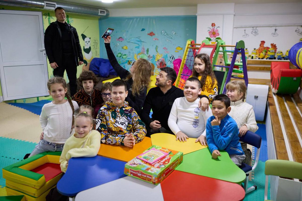 NOELreports's tweet photo. Zelensky visited Kherson to mark three years since its liberation. While there, he met with local children in a shelter, a reminder of the daily reality faced by residents under constant threat from Russian attacks. https://t.co/1DTF2wWnnF