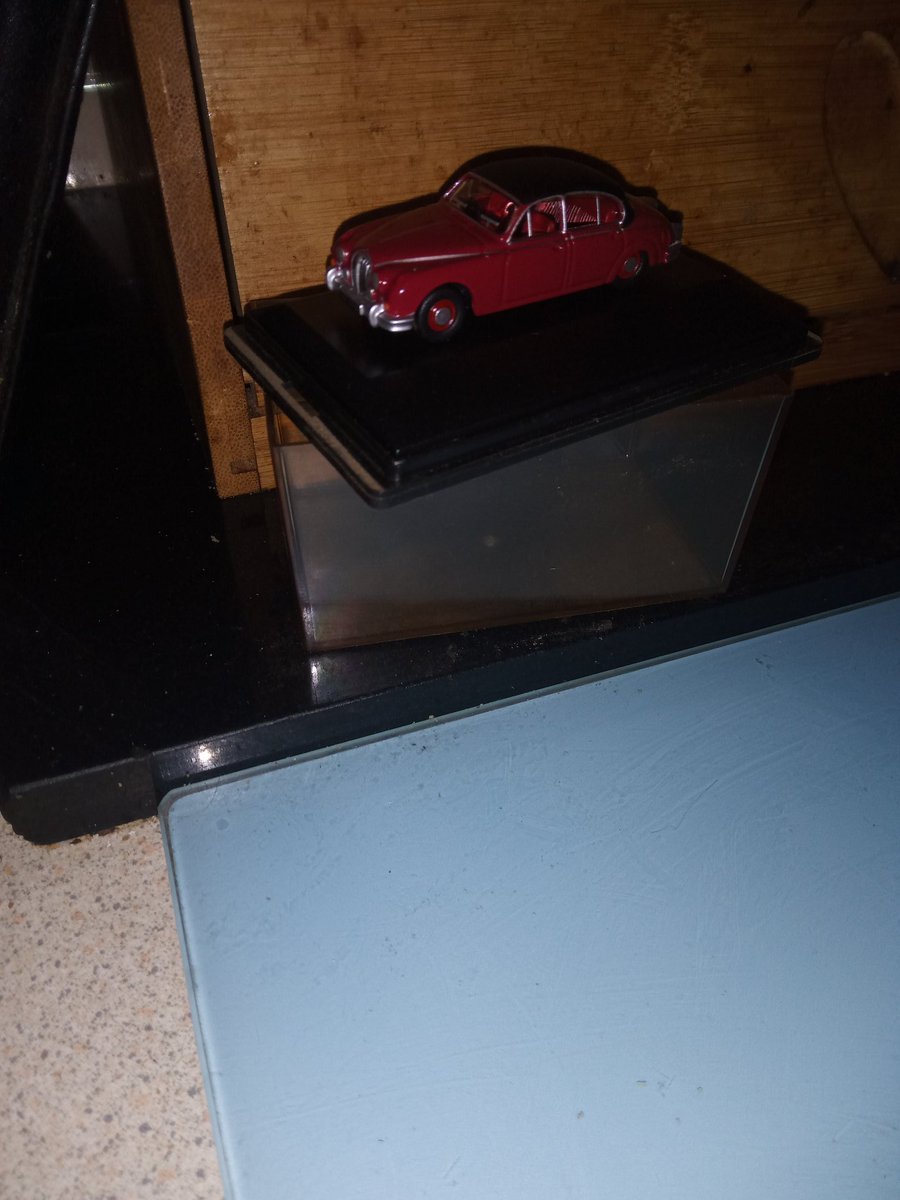 Backagainthird's tweet image. An unusual little find today. At first I thought it was a Matchbox or Dinky, but the signed card shows it to be a limited edition reproduction of Insp. Morse&apos;s red Jag. It always amazes me the treasures people donate to charity shops.