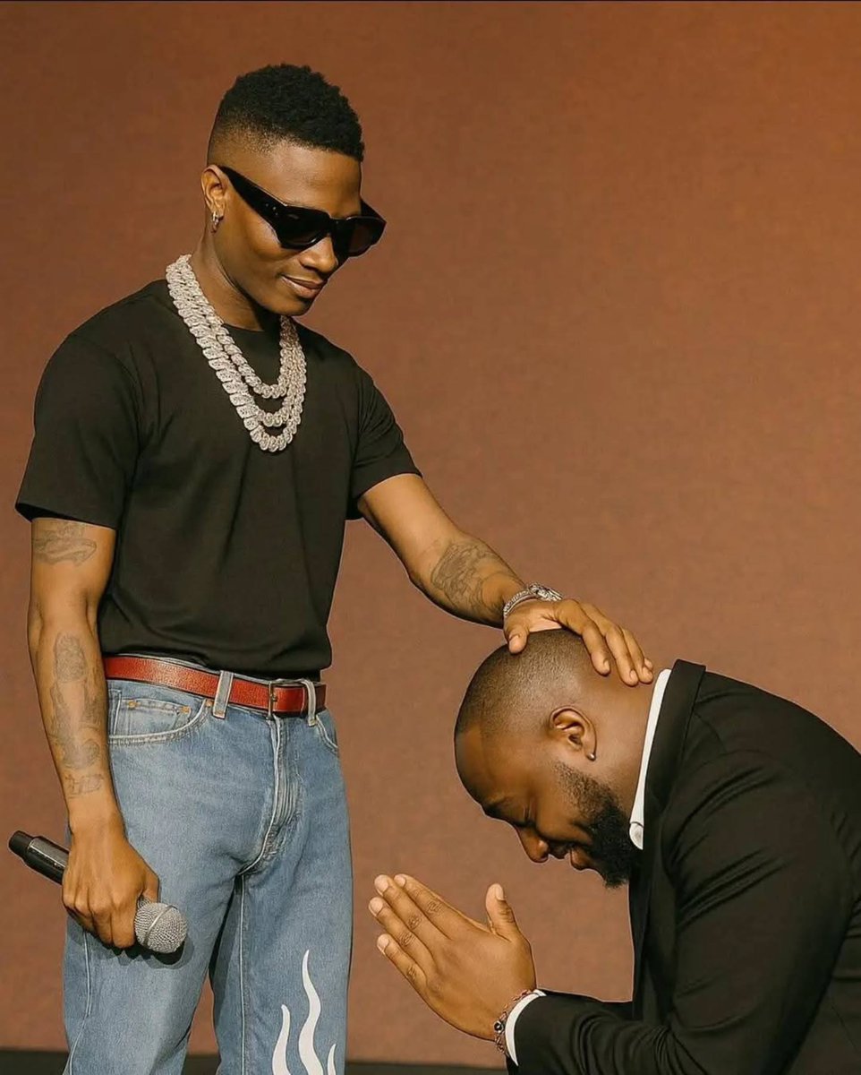 Bazzymoney's tweet photo. Davido finally bows down to Wizkid to bless him😂😭. https://t.co/Gf2RWu6bAf