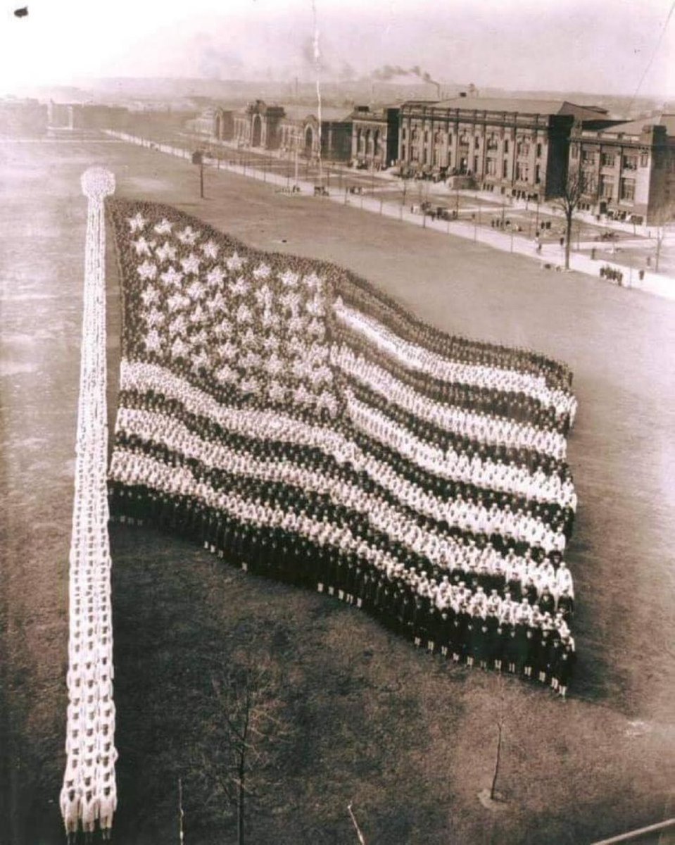 A living United States flag, formed by 10,000 Navy Sailors in Illinois, 1917.