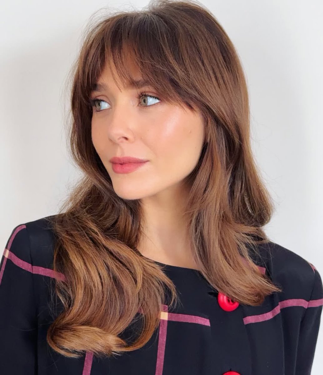 New photos of Elizabeth Olsen.

FACE CARD