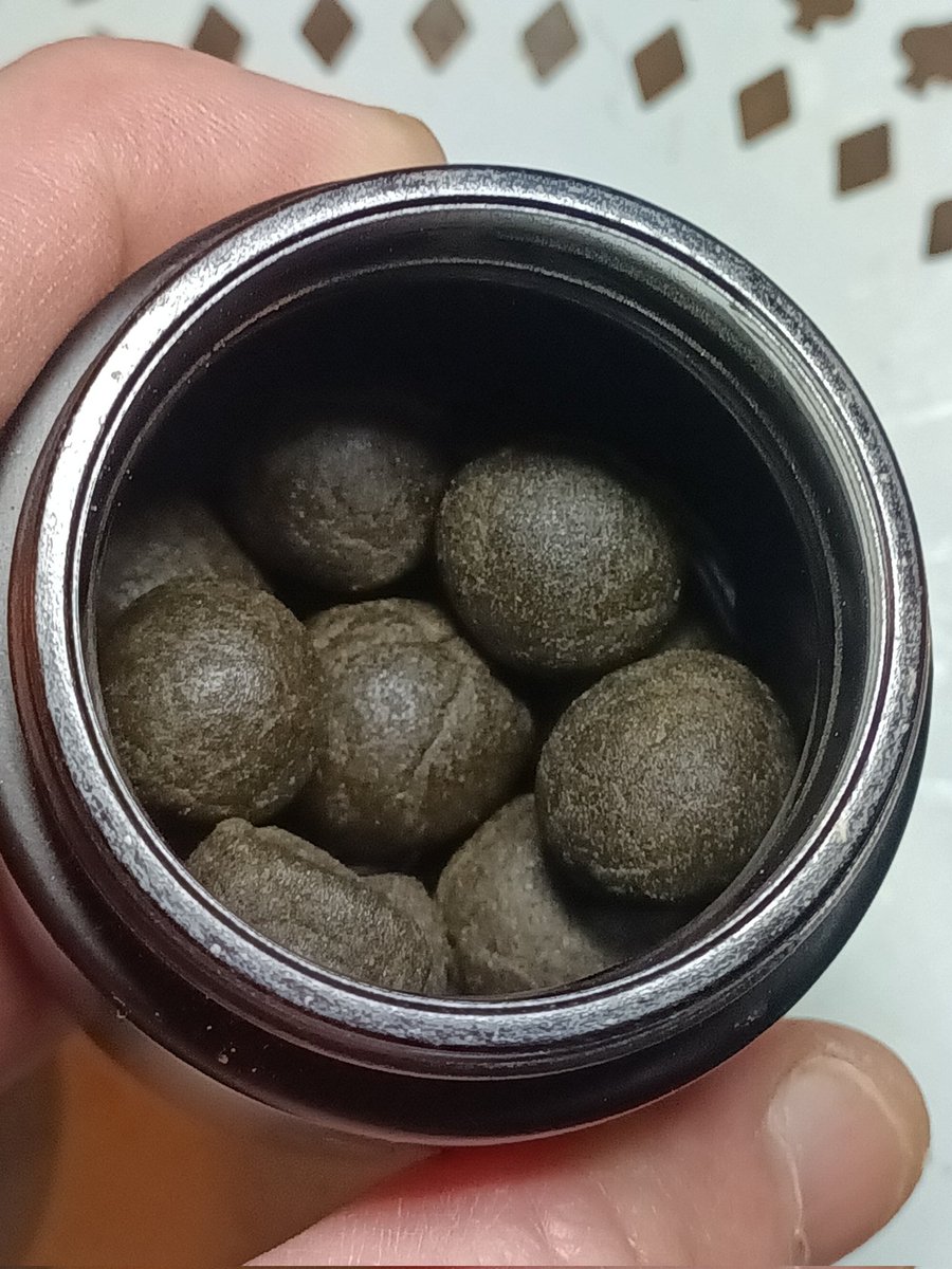 Lil jar full of some hash balls. They don't look good to some ppl but when u cut into one of them the smells are super strong n give u that full body hash high.