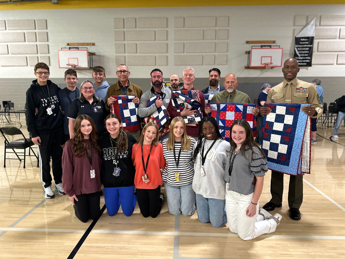 Give2Kids's tweet image. We&apos;re proud to celebrate Veterans Day with @wellbornms students and staff and see a very special EF Grant in Action! ❤️🤍💙 7th-grade math students collaborated to create quilt blocks as part of their class project to make lap-size quilts to present to veterans!
@csisd