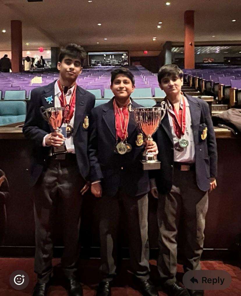 So these boys slayed the World Scholars Cup 2025 at Yale! Super proud of them! 
P.S. Wearing my son's medals!