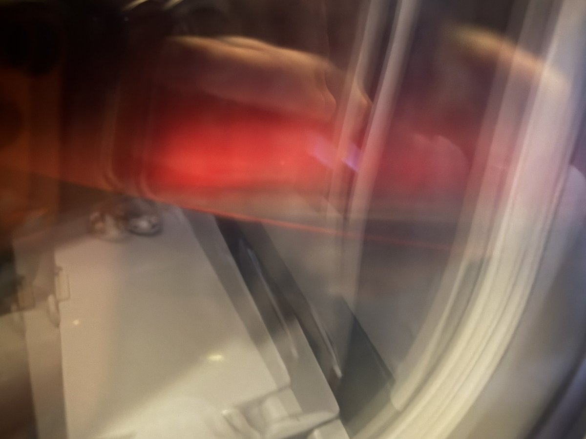 Ridiculous glare but we got the aurora from the plane somewhere over the California desert.