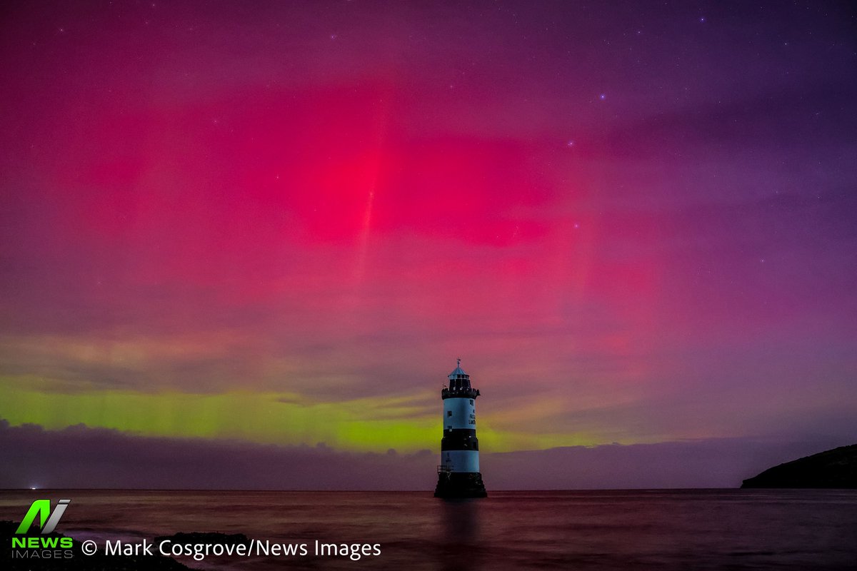 📍 Penmon Lighthouse, Anglesey, United Kingdom  
12.11.2025  

Northern Lights, also known as the Aurora Borealis, shine and dance over Penmon Lighthouse, Penmon. A rare celestial rave above the Irish Sea, painting the night in electric greens and purples. Mother Nature just