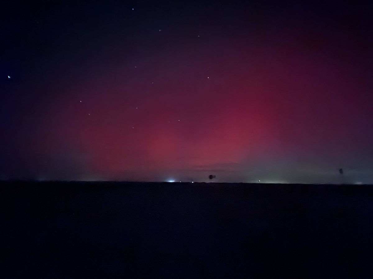 Aurora Borealis… at this time of year, at this time of day, located entirely just outside my kitchen.