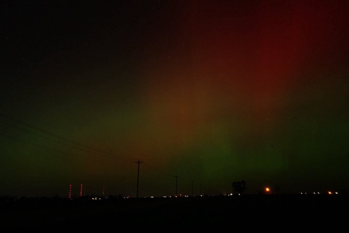 jacob_holck's tweet photo. Aurora was awful pretty tonight and I fulfilled a bucket list item seeing it with the naked eye! Peep @WHO13news and @KCCINews towers in the shot and @IowaRECs Consumer Energy for providing the power poles to make it happen! https://t.co/Ys6aD0kvWM