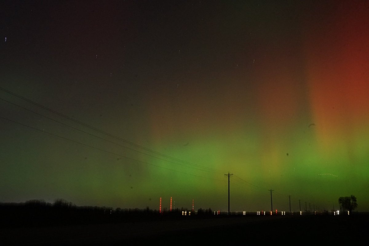 jacob_holck's tweet photo. Aurora was awful pretty tonight and I fulfilled a bucket list item seeing it with the naked eye! Peep @WHO13news and @KCCINews towers in the shot and @IowaRECs Consumer Energy for providing the power poles to make it happen! https://t.co/Ys6aD0kvWM