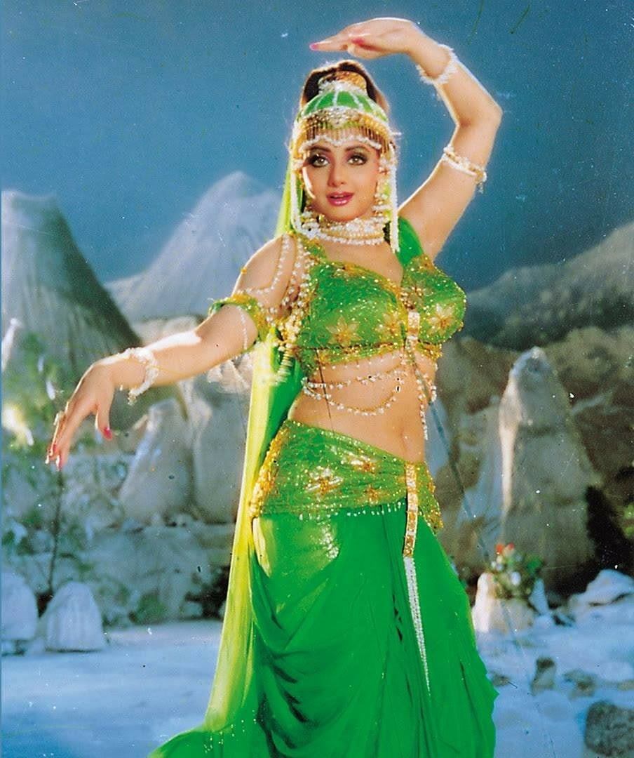 SrideviKapoor's tweet photo. @alena18876160 Its to be noted how often Sridevi repeated her glittering ensemblems back in the day. Most will instantly recognise the green look from JVAS, but she wore the same look in Gurudev too. 
#Sridevi 
@SrideviBKapoor https://t.co/kkyrjLPypH