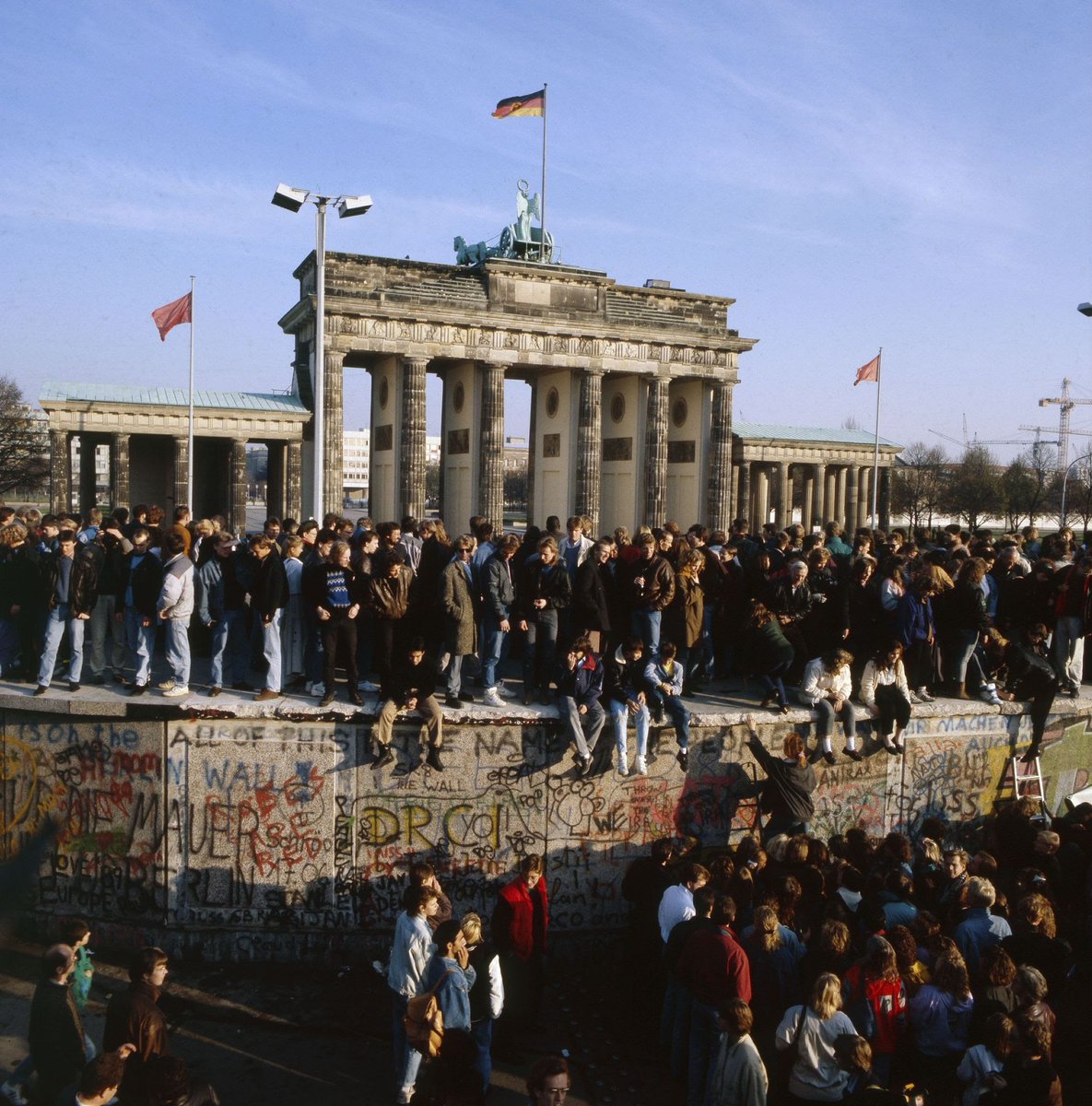 36 years ago the Berlin Wall fell.
The Iron Curtain began to crumble, the empire of evil began to disintegrate , the border that divided us from them began to evaporate. 

We, the free ones, them under a totalitarian regime. 
We, who could aspire to do more, to do better, to say