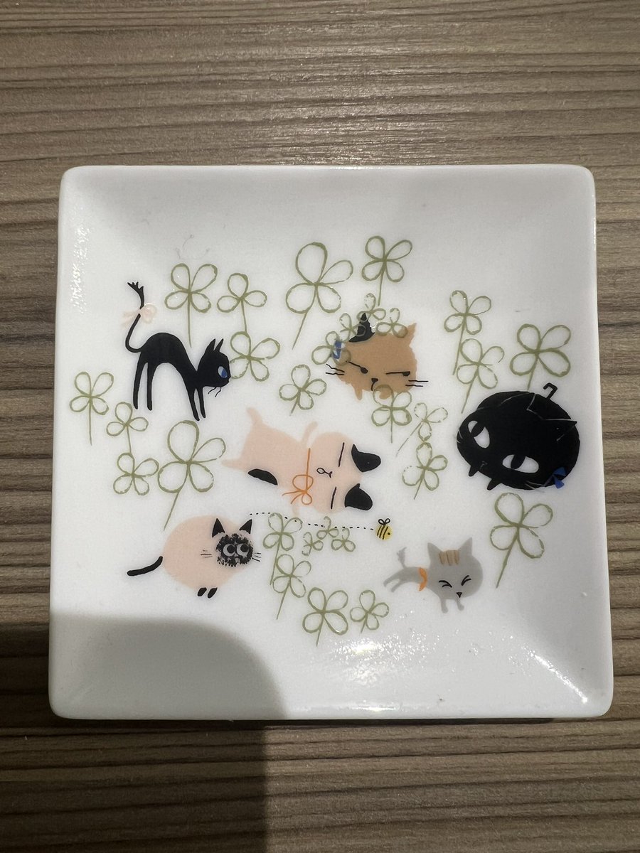 I bought this in Japan maybe 8 years ago - I’ve always wondered what the weird alien baby head with the vampire teeth was doing on there.  It’s a fat black cat isn’t it.  Wtf is wrong with me? 🤪😩