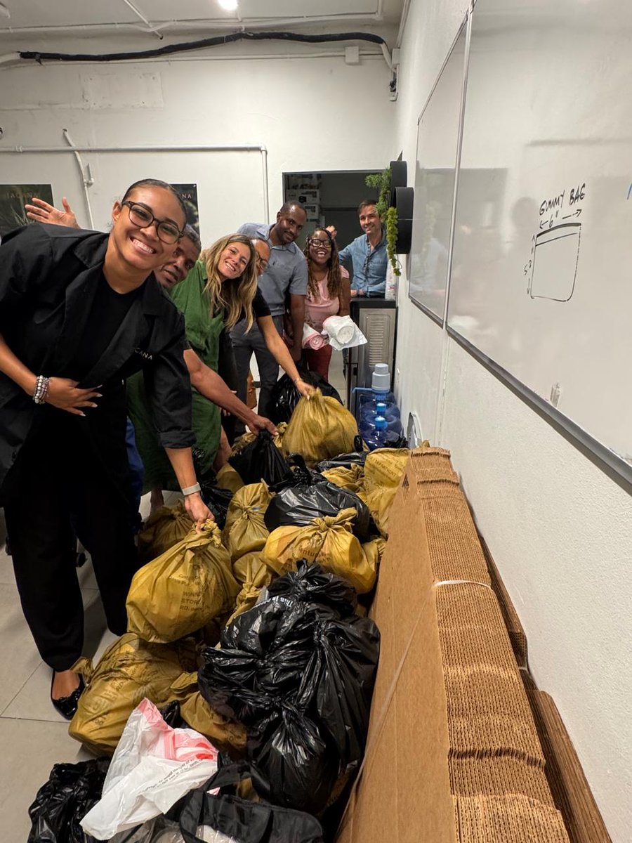 JacanaLife's tweet photo. Hands to work, hearts wide open. Packing food and supplies for families after Hurricane Melissa: smiles, sweat, and solidarity in every bag.

This is community in motion. #HurricaneMelissa #CommunityRelief #MutualAid https://t.co/ALDrtmnxYl