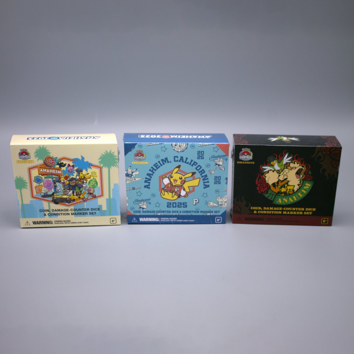 MATOBADESIGN's tweet photo. Pokémon WCS 2025 (Anaheim) Premium Counter Case, full set of 3 designs.

*feel free to use this photography for non-commercial usage with credit of photographer: MATOBA https://t.co/GVvylOklp8