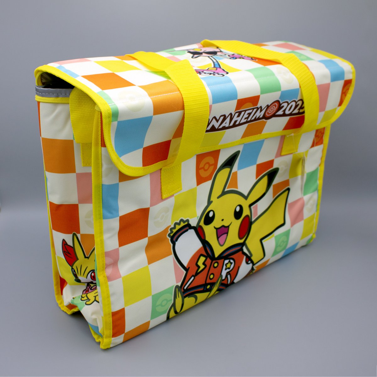 MATOBADESIGN's tweet photo. Pokémon WCS 2025 (Anaheim) Pokémon Center bags of varying designs. Was Anaheim themed against the varsity blues of Grease or the Summer beach waves of Grease? It's your pick.

*feel free to use this photography for non-commercial usage with credit of photographer: MATOBA https://t.co/C5W4QbZAXe