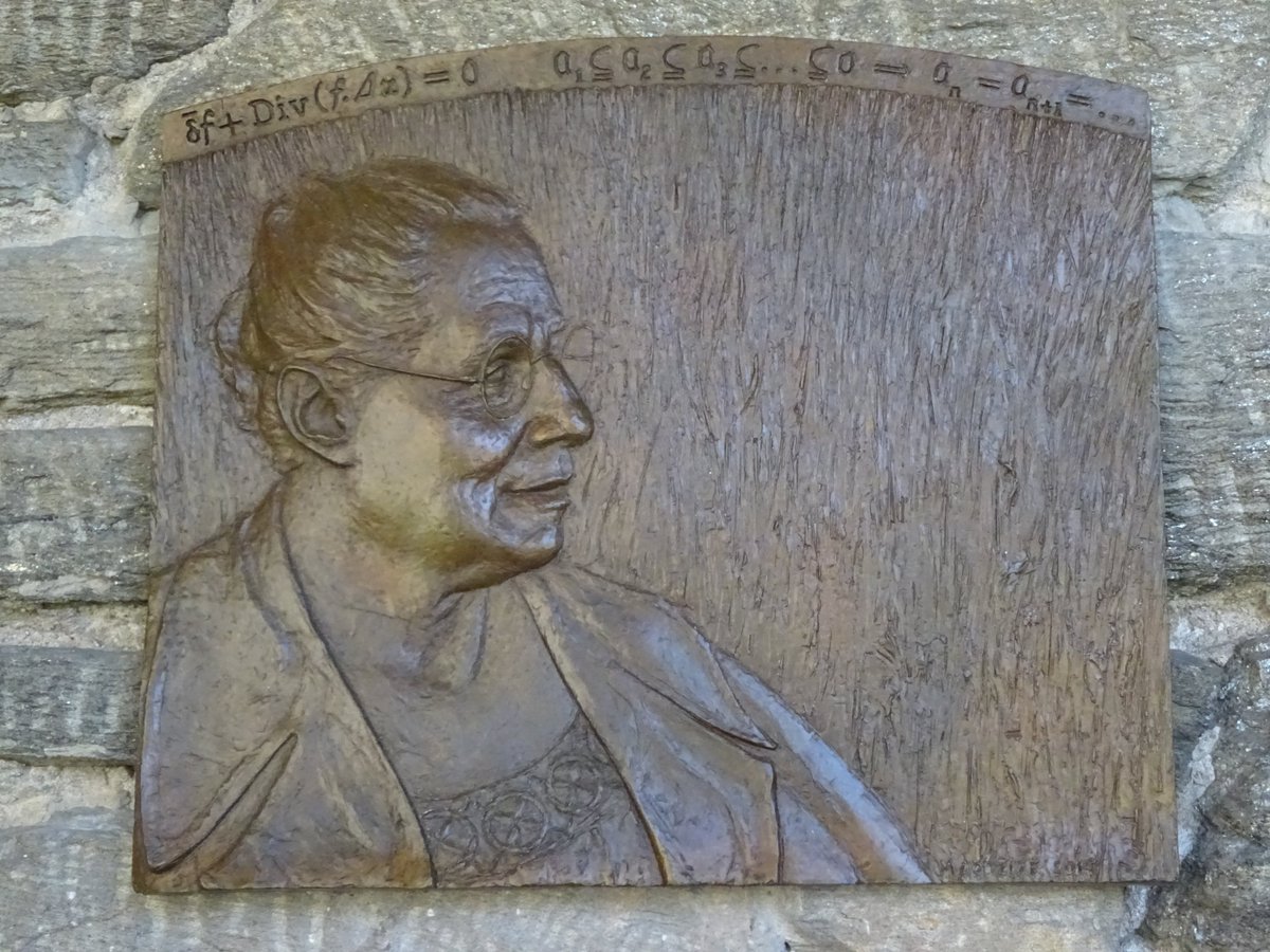 phalpern's tweet image. Tributes at Bryn Mawr College to the brilliant mathematician Emmy Noether, who spent her final years there.

Noether revolutionized the methods of modern physics by identifying continuous symmetry groups with conservation laws.

The third image is her grave marker. 

#Mathematics