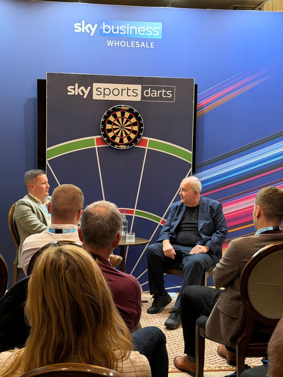 Symbiosis_UK's tweet image. Power-packed evening at #CommsVision! Darts legend Phil “The Power” Taylor wowed delegates at Gleneagles with a Fireside Chat + masterclass, part of Sky Business’s sponsorship. Proud to design + build the branded set + darts oche for this iconic moment. 
#EventDesign…